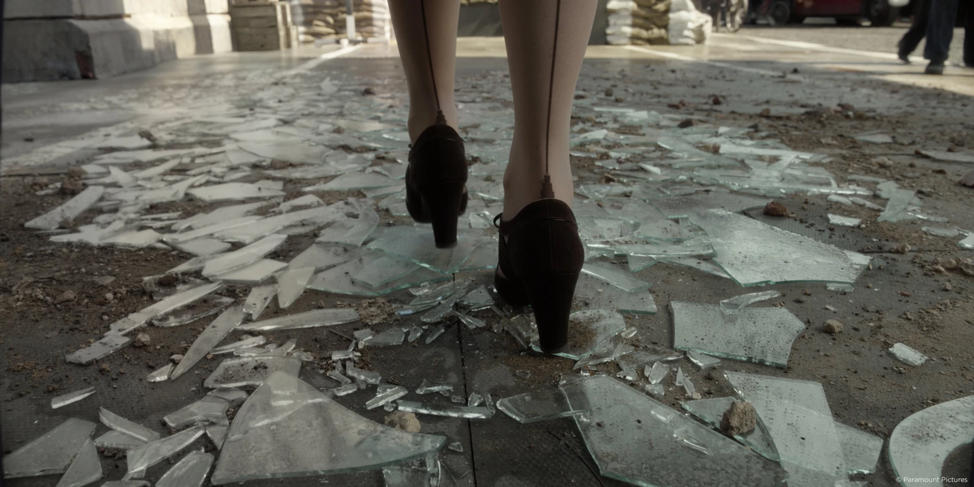 Woman with heels walking on broken glass in Allied Raynault vfx